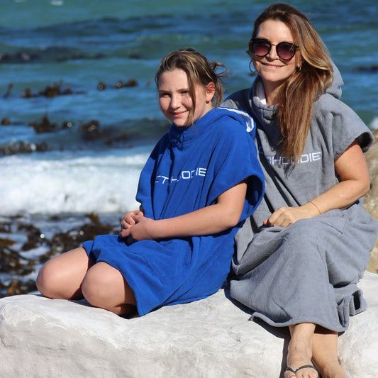 Mother and daughter wearing Octohoodies during a day out to the beach