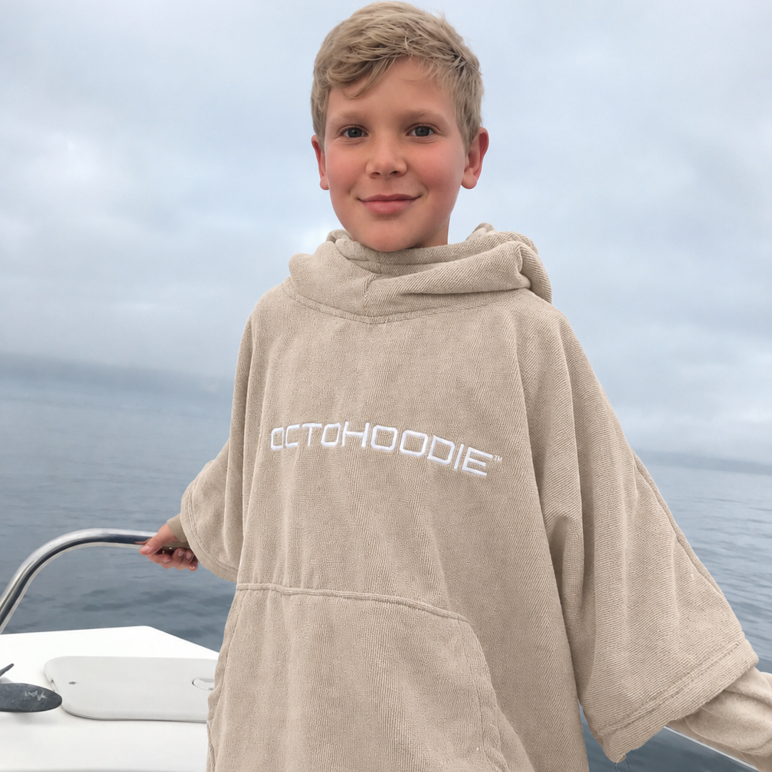 Boy on a boat wearing an Octohoodie