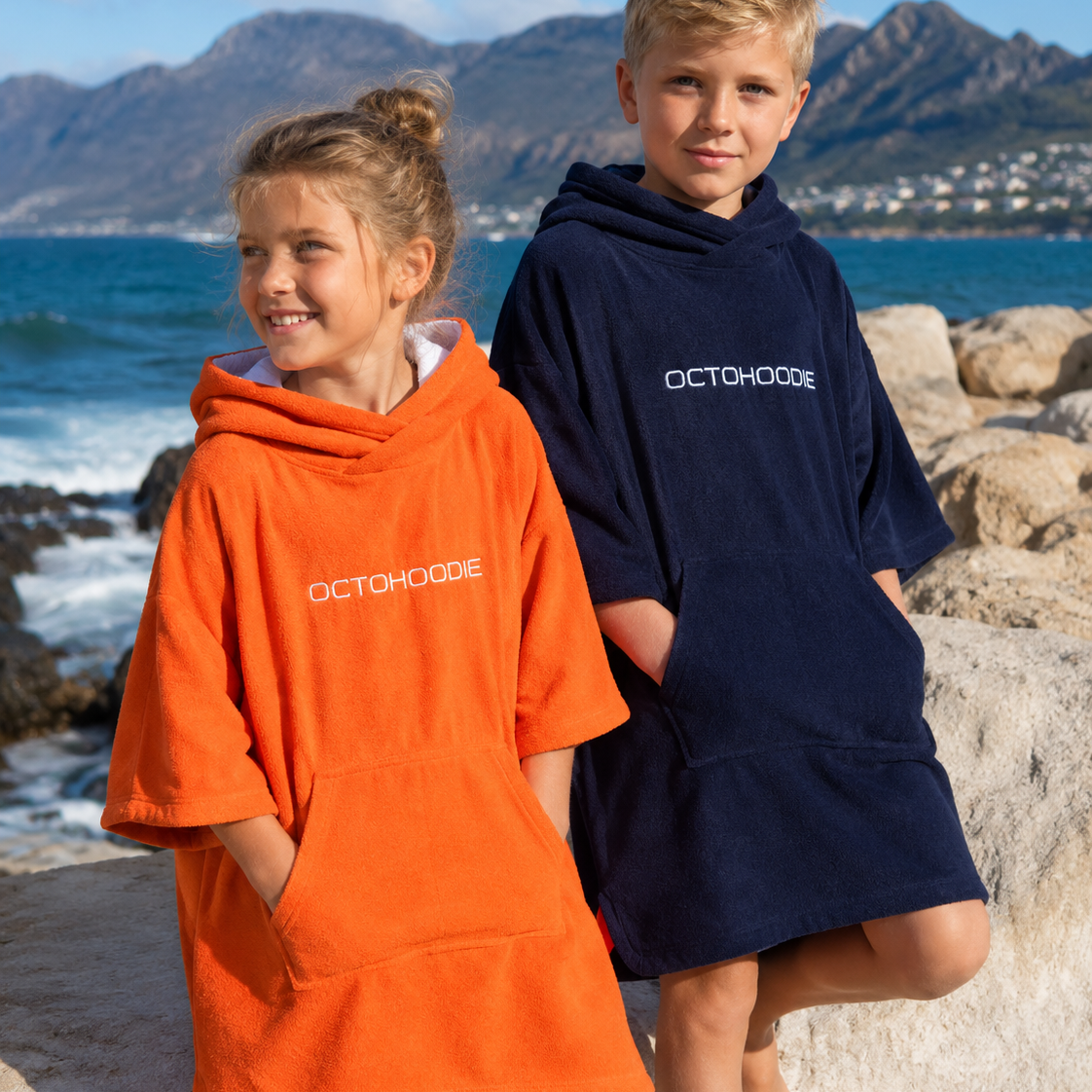 Siblings in Octohoodie at tidal pool