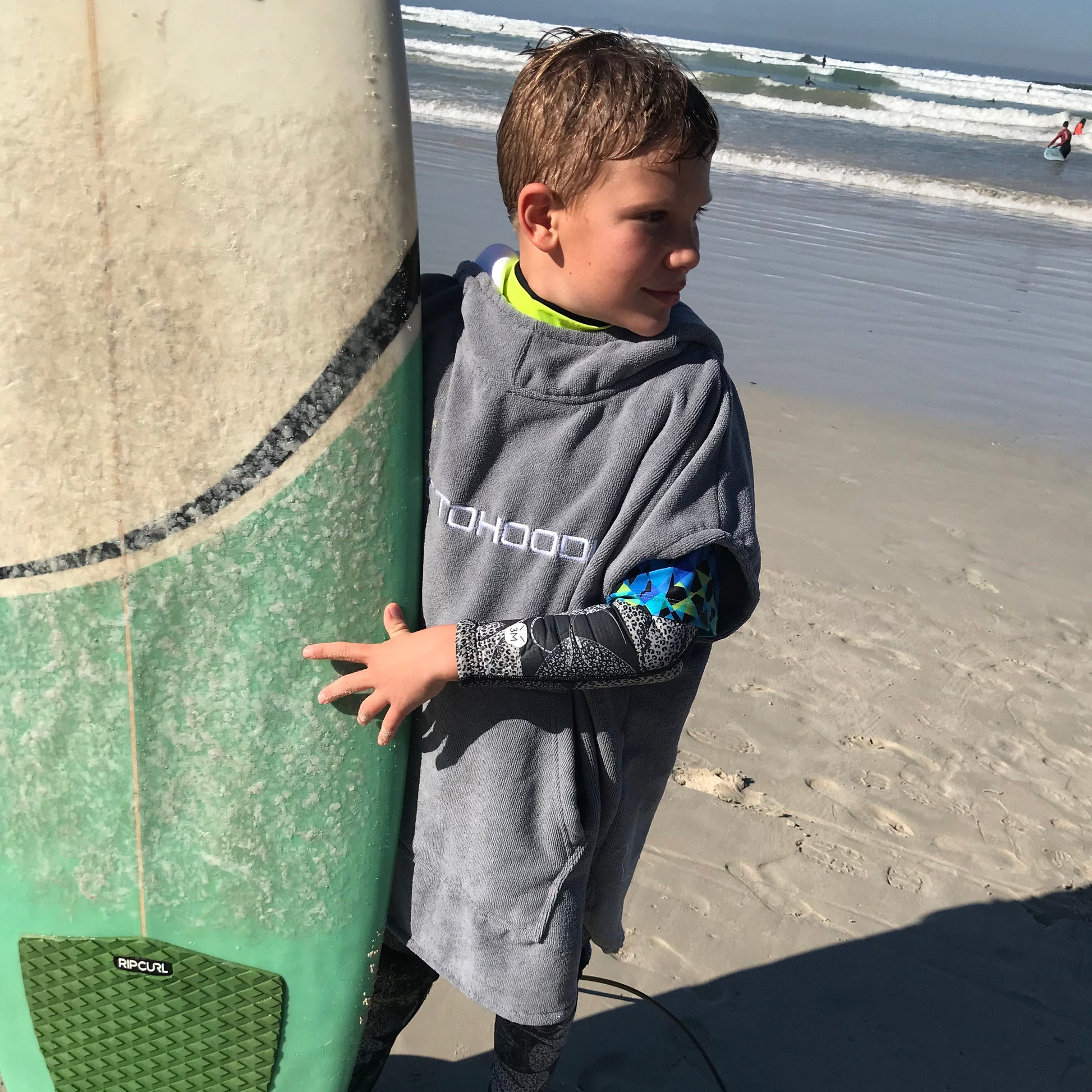 Kids surfing at the beach