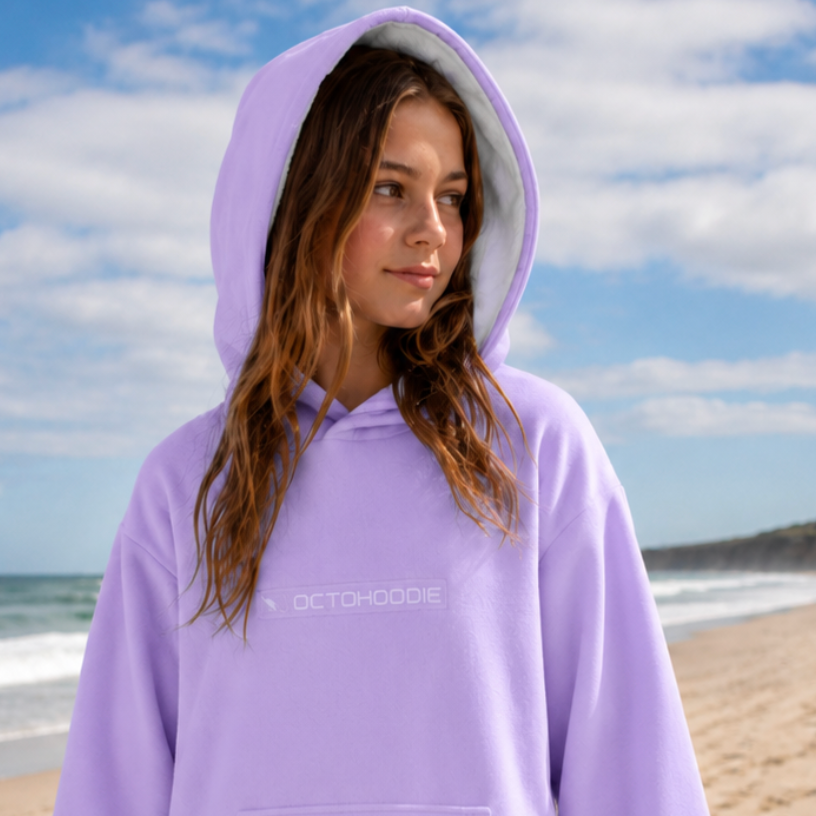 Octohoodie long sleeve swimming poncho on girl on the beach